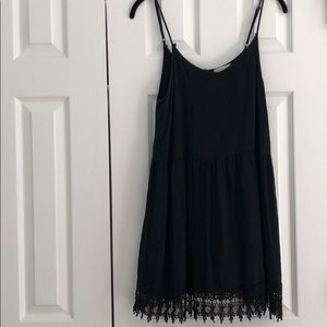 Black babydoll dress with lace trim